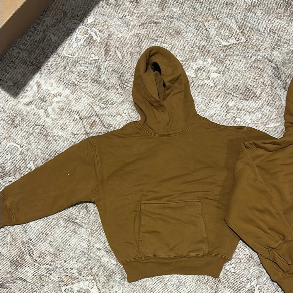 Brown oversized pullover hoodie in soft sweatshirt material